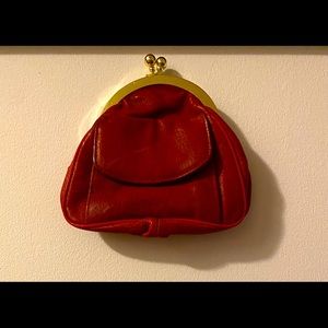 Vintage red leather clutch.